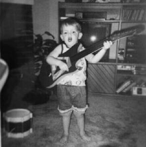 lil James with guitar